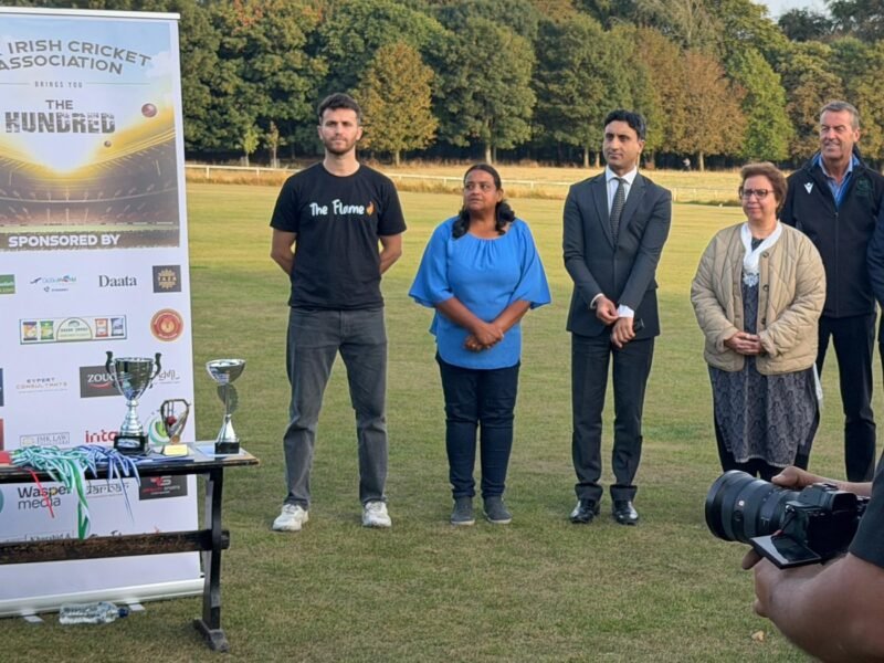 The Flame at the Irish Cricket Association's The Hundred match, with the trophies on the table